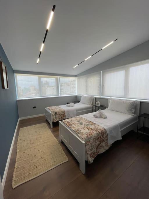 Апартаменты Voyage Penthouse Тирана Экстерьер фото